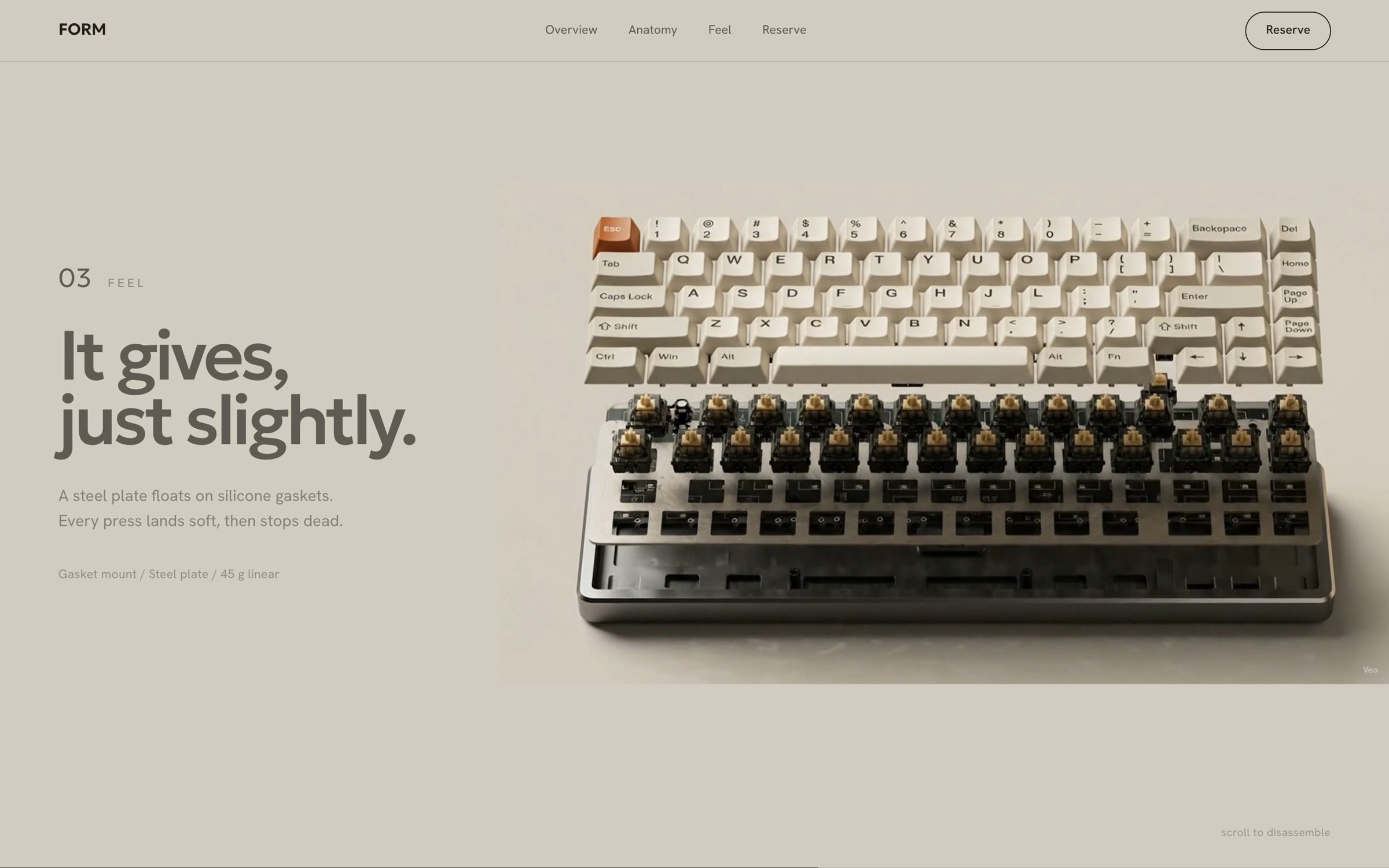 Switches exposed beneath floating keycaps beside ‘It gives, just slightly’.