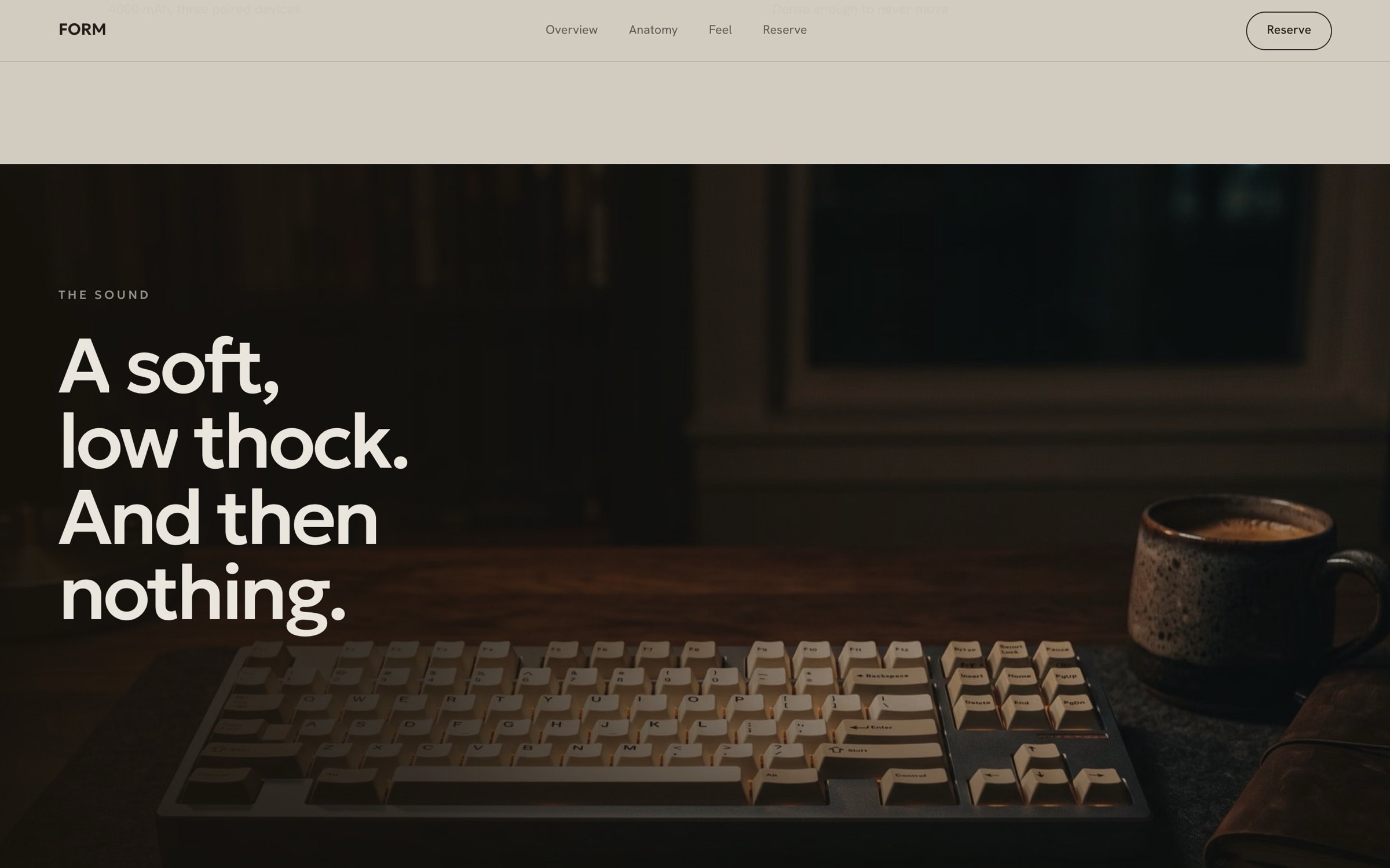 Dark sound section: ‘A soft, low thock. And then nothing.’ over a keyboard on a desk at night.